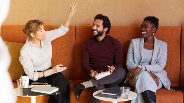 Happy participants in a Swedish language course